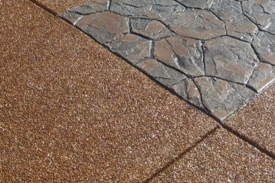 Close up picture of closeup aggregate concrete and stamped concrete pads